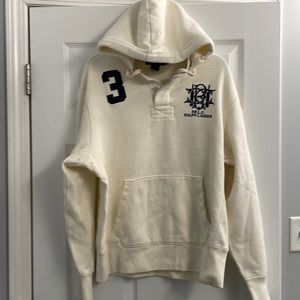 Men’s Polo by Ralph Lauren hooded sweatshirt with front pocket in color cream.